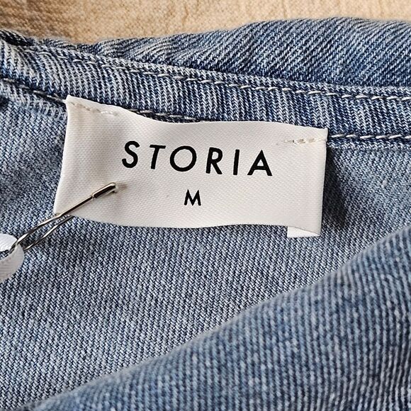 Storia Light Wash Denim Button Front Ruffle Collar Belt Loop Side Pockets Romper - Picture 7 of 14